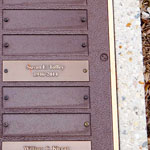 First of ten Toffey's death in Memorial Garden Plaques, stone, Susan F. Toffey. 1946-2014, 68 years.